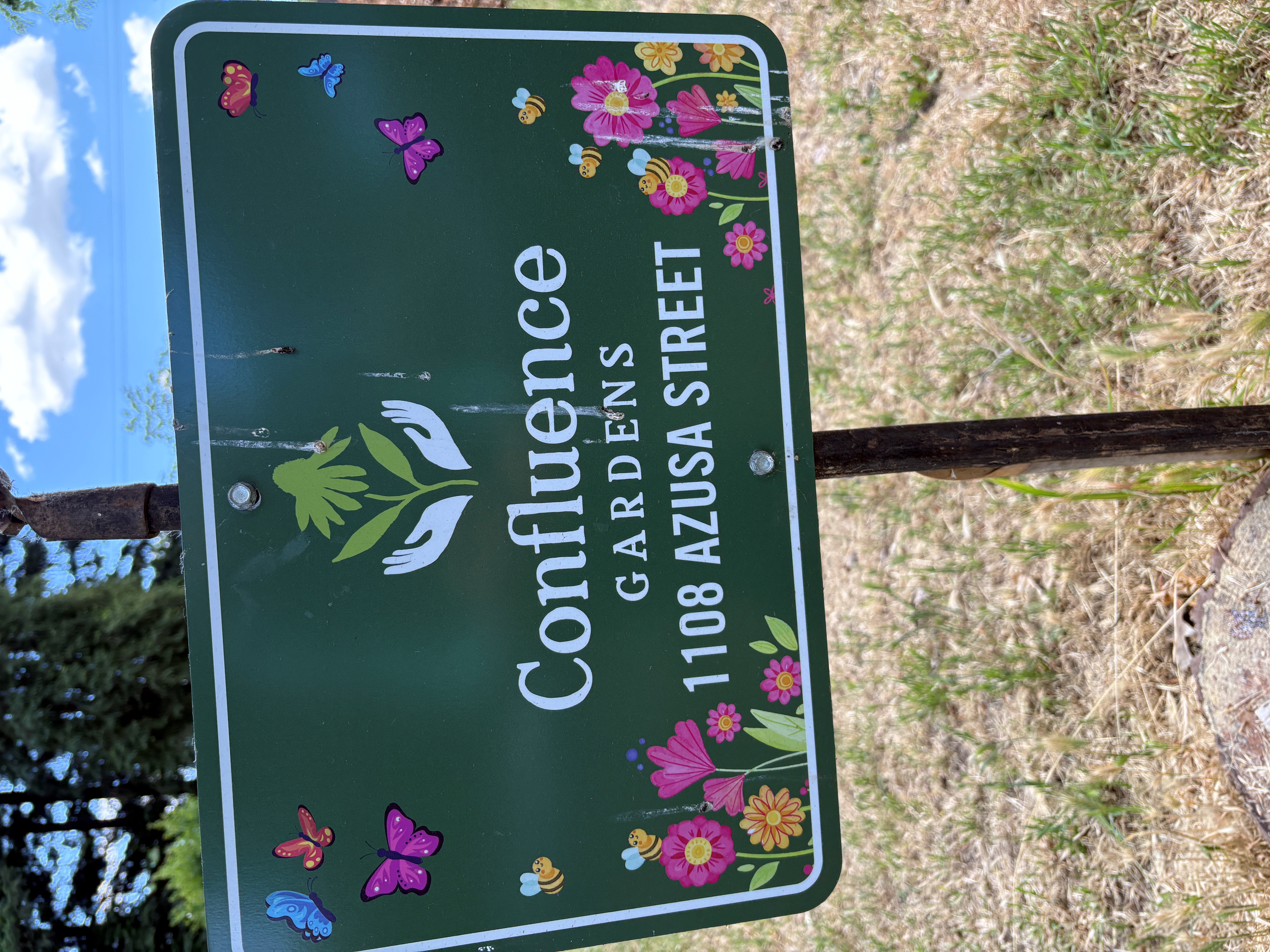 Confluence gardens sign